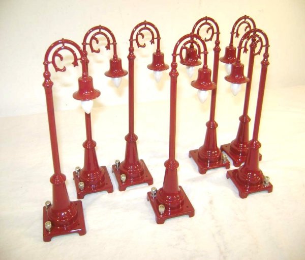 ABT: 6 MTH #MT-1019 Maroon #64 Lamp Posts: Paul V. Ambrose and Drew J. Bauer present: These are six #MT-1019 Maroon #54 Lamp Posts that MTH made a few years ago as a remake of the Lionel item from the 1930s. Our Opinion is that they are genera