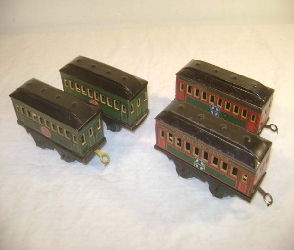 ABT: 4 Hafner Overland Flyer Passenger Cars/2 SF a: Paul V. Ambrose and Drew J. Bauer present: These are four Overland Flyer Passenger Cars that Hafner made in O Gauge in the 1920s. Two have Santa Fe Stickers while the other two have New York Central S