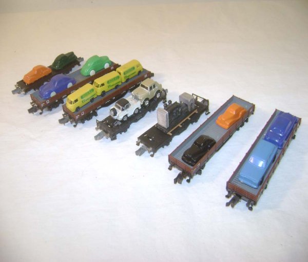 ABT: 7 Assorted TT Rokal Freight Flat Cars with Loa: Paul V. Ambrose and Drew J. Bauer present: These are 7 Assorted Freight Flat Cars with Loads that Rokal made in TT Gauge in the 1950s. Our Opinion is that they are generally in Like New Minus Conditio