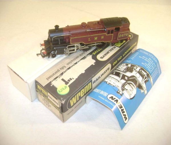 ABT: OO/HO - Wrenn #W2219 2-6-4 Tank LMS Engine/OB: Paul V. Ambrose and Drew J. Bauer present: This is the #W2219 2-6-4 Tank LMS Engine that Wrenn made in HO/OO Gauge in the 1970s. Our Opinion is that it is generally in Like New Condition, minor wear. 