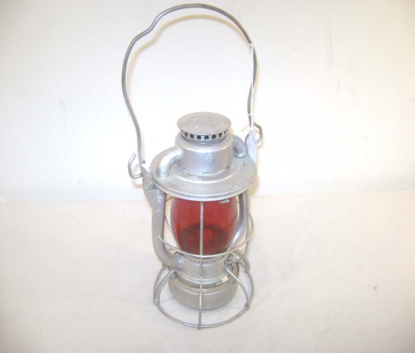 ABT: Kerosene Dietz/Vesta Lantern Marked for the N: Paul V. Ambrose and Drew J. Bauer present: This is a Kerosene Railroad Lantern made by Dietz/Vesta and marked "NH" for the New Haven Railroad. No lettering on glass. Our Opinion is that it is generall