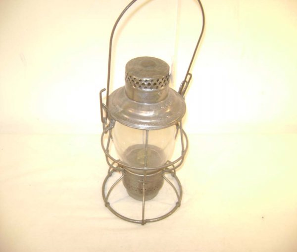 ABT: Kerosene Adlake Lantern Marked for the Maine : Paul V. Ambrose and Drew J. Bauer present: This is a kerosene Railroad Lantern made by Adlake and marked "M.C.R.R." for the Maine Central. No markings on the glass. Our Opinion is that it is generally