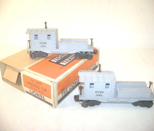 ABT: 2 Lionel #6419 DL&W Work Cabooses/OB: Paul V. Ambrose and Drew J. Bauer present: These are two #6419 DL&W Work Cabooses that Lionel made in the 1950s. Our Opinion is that they are generally in Excellent Condition. Includes one Original 55