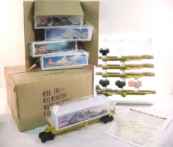 ABT: Mint K-Line #K77026IC TTAC 5 Car Spine Set/OB: Paul V. Ambrose and Drew J. Bauer present: This is the #K77026IC TTAC 5 Car Spine Set with Containers that K-Line made in O Gauge a few years ago. Our Opinion is that the Set is generally in Mint Cond