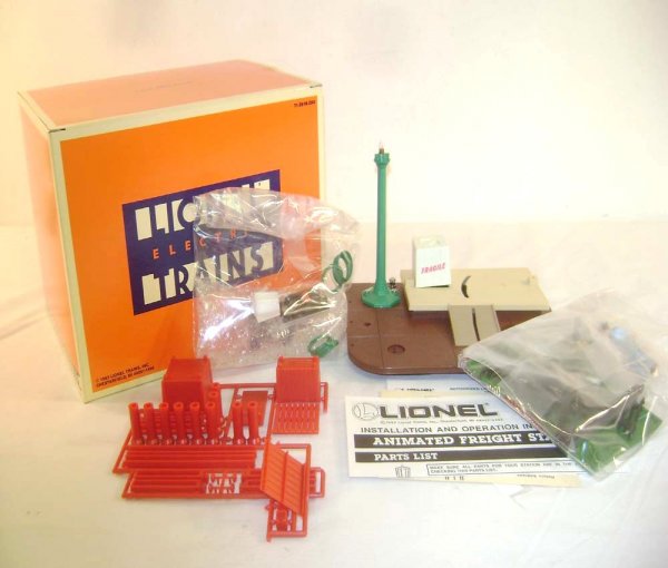 ABT: Mint Lionel #12818 Animated Freight Station/O: Paul V. Ambrose and Drew J. Bauer present: This is the #12818 Animated Freight Station Accessory that Lionel made a few years ago. Our Opinion is that it is generally in Mint Condition, no signs of us