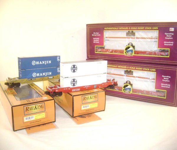 ABT: 4 Mint Assorted MTH Huskey Stack Cars/OBs: Paul V. Ambrose and Drew J. Bauer present: These are four Assorted Huskey Stack Cars that MTH made in O Gauge a few years ago. Included are the #30-7643 Hanjin, the #30-7644 Santa Fe, and two #20-9500