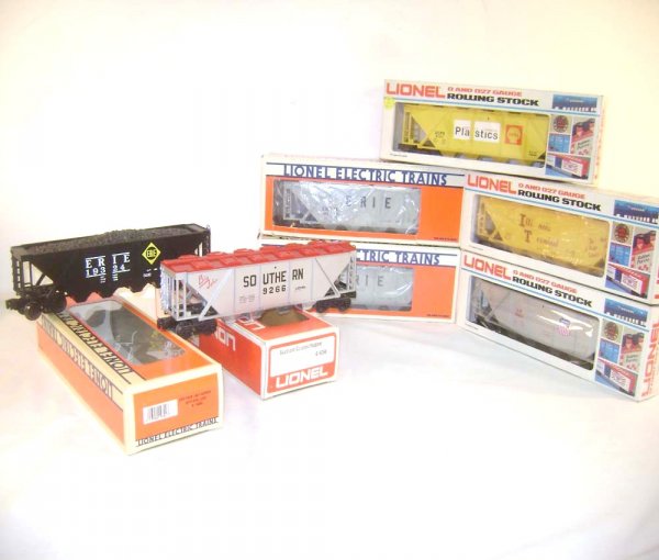 ABT: 7 Mint Lionel Assorted Hoppers/OBs: Paul V. Ambrose and Drew J. Bauer present: These are seven Assorted Hoppers that Lionel made in the 1970s and 1980s. Included are two #6118 Erie Lackawanna Covered Hoppers, the #19324 Erie Four-Bay Co