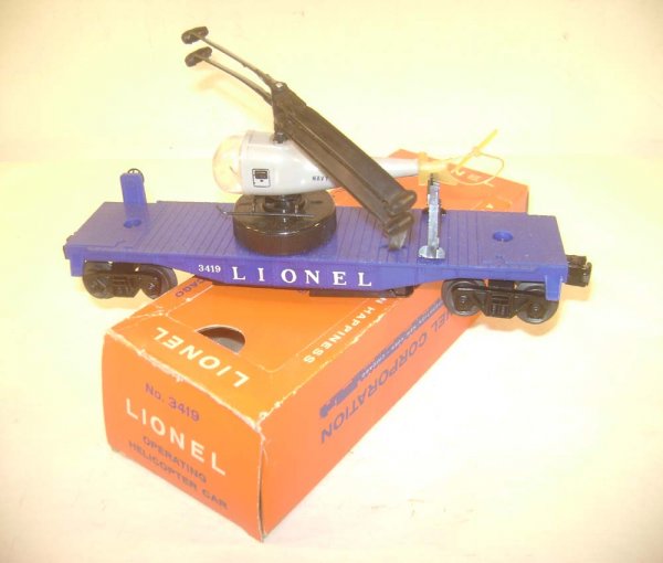ABT: Lionel #3419 Operating Helicopter Car - Dual B: Paul V. Ambrose and Drew J. Bauer present: This is the #3419 Operating Helicopter Car that Lionel made circa 1959. Early production Dark Navy body, Large 2-inch Winder, and an Original unbroken twin-b
