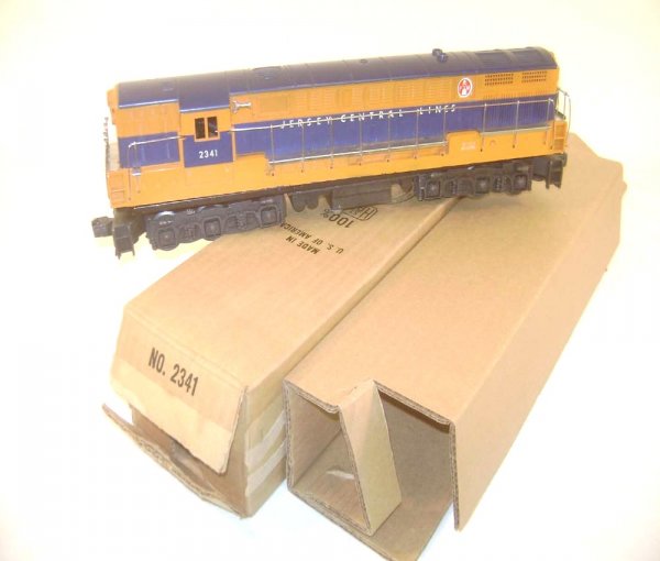 ABT: Nice Lionel #2341 Dull Jersey Central FM /Grea: Paul V. Ambrose and Drew J. Bauer present: This is the #2341 Jersey Central FM Diesel Engine that Lionel made circa 1956. Dull Orange Variation with the seldom-seen Original "2341" Box; the box alone