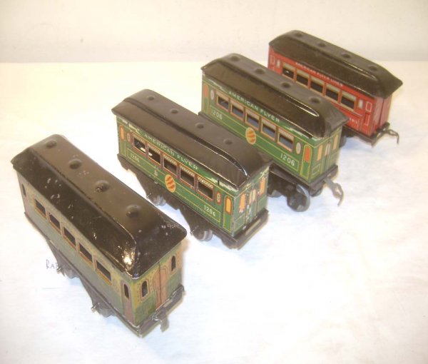 ABT: 4 Assorted 6 1/4-inch American Flyer O Gauge P: Paul V. Ambrose and Drew J. Bauer present: These are four 6 1/4-inch Passenger Cars that American Flyer made in O gauge in the 1920s. Included are a scarce #1103 Parlor Car, the red #1103 Pullman and 