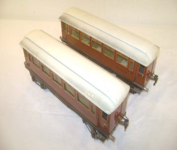 ABT: 2 Marklin 1 Gauge Mitropa Coaches: Paul V. Ambrose and Drew J. Bauer present: These are two Mitropa Coaches that Marklin made in 1 Gauge before World War II. One Sleeper and one Diner with interior detailig. Our Opinion is that they ar