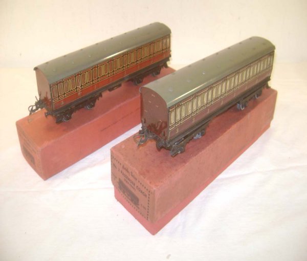 ABT: 2 Hornby #2 O-Gauge LMS Passenger Coaches/OB: Paul V. Ambrose and Drew J. Bauer present: These are two #2 1st/3rd LMS Coaches that Hornby made in O-Gauge circa the 1930s. Our Opinion is that they are generally in Excellent Minus Condition. Includ