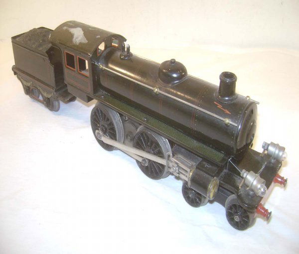 ABT: Marklin 1 Gauge #E55/13041 Electric Steam Eng: Paul V. Ambrose and Drew J. Bauer present: These are the #E55/13041 Electric Steam Engine and tender that Marklin made in 1 gauge in the 1920s. Our Opinion is that they are generally in Very Good Cond