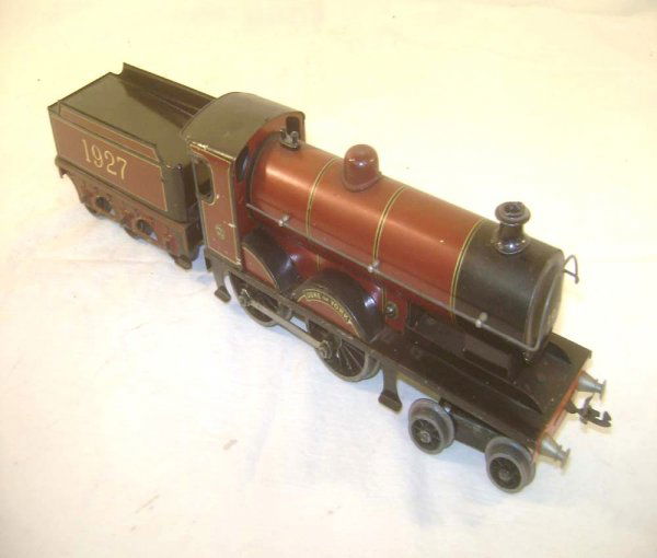 ABT: Great Bassett Lowke 1927 Duke of York Express: Paul V. Ambrose and Drew J. Bauer present: These are the #1927 Duke of York 4-4-0 Express Steam Clockwork Engine and Six Wheel Tender that Bassett-Lowke made in O Gauge in the 1930s. Our Opinion is th