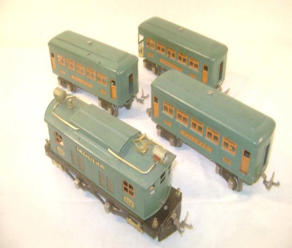 ABT: Lionel #253E Peacock Electric w/#607/7/8 Pass: Paul V. Ambrose and Drew J. Bauer present: These are the #253 Peacock Blue Electric and the #607/607/608 Peacock Blue Passenger Cars that Lionel made in O Gauge in the late 1920s. Restored; the mechan