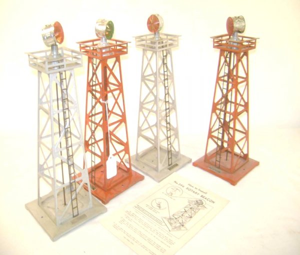 ABT: 4 Lionel #394 Rotary Beacons: Paul V. Ambrose and Drew J. Bauer present: These are four #294 Rotary Beacons that Lionel made in the 1950s. Included are two Red and two Silver examples that would be great for the Layout; includes f