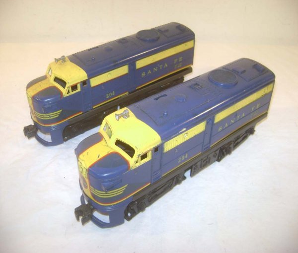 ABT: Lionel #204P/T Santa Fe Alco AA Diesels: Paul V. Ambrose and Drew J. Bauer present: These are the #204P/T Santa Fe Alco AA Diesels with Magnetraction and Horn that Lionel made in the later 1950s. Our Opinion is that they are generally in Ver