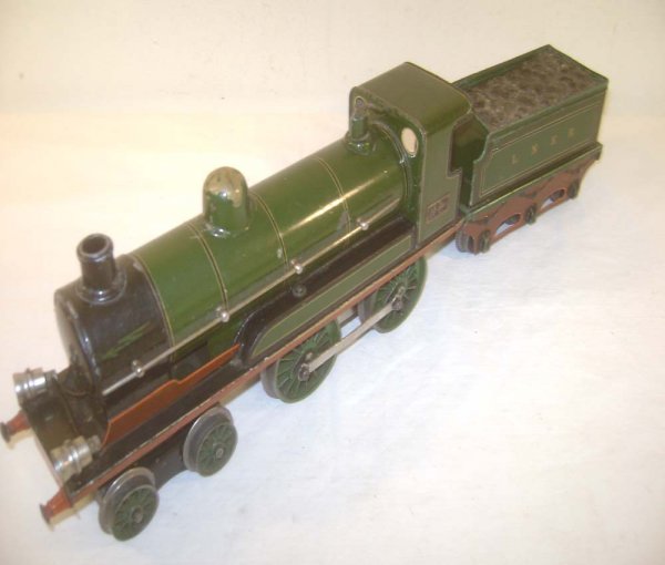 ABT: Marklin 1 Gauge Electric #E3131 4-4-0 Steam Lo: Paul V. Ambrose and Drew J. Bauer present: These are the #E3131 4-4-0 Electric Steam Locomotive and Tender that Marklin made in 1 gauge circa 1930. Our Opinion is that they are generally in Very Good 