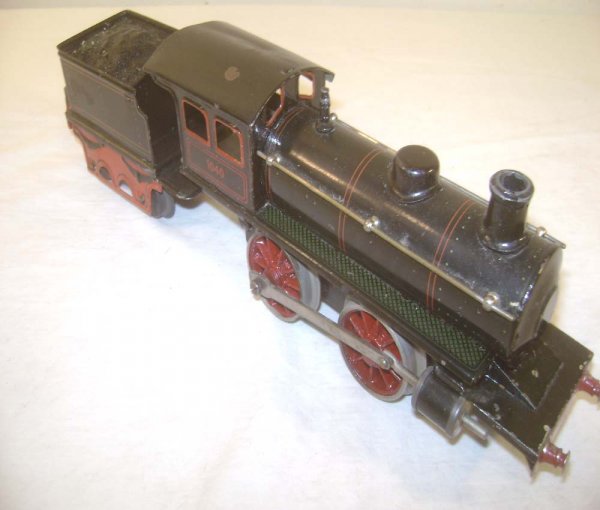 ABT: Marklin O Gauge Clockwork #1040 Locomotive & : Paul V. Ambrose and Drew J. Bauer present: These are the Clockwork #1040 Locomotive and Tender that Marklin made in O -gauge circa 1930. Tender marked "0/35". Our Opinion is that they are generally in
