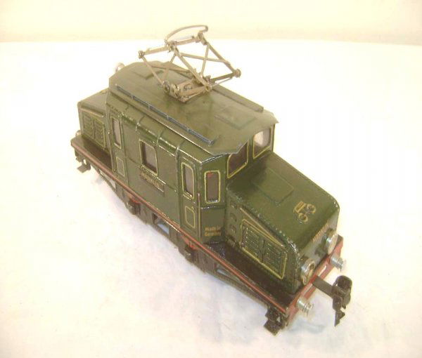 ABT: Marklin O Gauge Clockwork Dark Green Electric: Paul V. Ambrose and Drew J. Bauer present: This is the Dark Green Clockwork Electric-Type Engine that Marklin made in O Gauge in the 1930s. Our Opinion is that it is generally in Very Good Condition.
