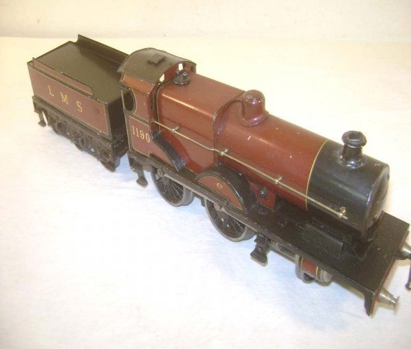 ABT: Bassett-Lowke Clockwork #1190 LMS O Gauge Loc: Paul V. Ambrose and Drew J. Bauer present: These are the #1190 Clockwork LMS 4-4-0 Engine and Tender that Bassett-Lowke made in O-gauge circa 1930. Our Opinion is that it is generally in Very Good Plu