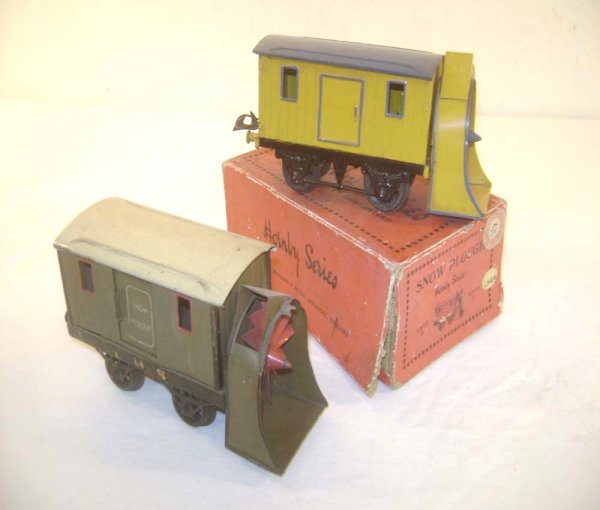 ABT: Two Hornby Snow Ploughs/OB: Paul V. Ambrose and Drew J. Bauer present: These are two Snow Ploughs that Hornby made in O-gauge circa 1930. One LMS and one unmarked example. Our Opinion is that they are generally in Very Good Cond