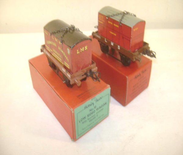 ABT: 2 Hornby O Gauge Low-Sided Wagons w/Furniture: Paul V. Ambrose and Drew J. Bauer present: These are two Low-Sided Wagons with Furniture Containers that Hornby made in O-gauge both Pre and Post War. Our Opinion is that they are generally in Excelle