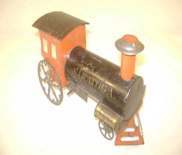 ABT: Rare Ives Tin 'Saratoga' Trackless Clockwork: Paul V. Ambrose and Drew J. Bauer present: This is the exceptionally rare tin "Saratoga" trackless Clockwork Steam Engine that Ives made circa the 1880s. We did not test the mechanism, and it is not w