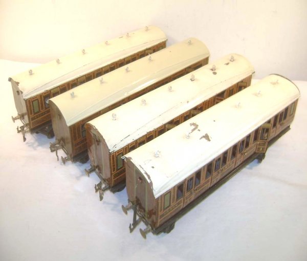 ABT: 4 Great Marklin 1 Gauge LNER Passenger Coache: Paul V. Ambrose and Drew J. Bauer present: These are four LNER Passenger Coaches made by Marklin in 1 Gauge circa the 1920s. Included are 3 1st Class Coaches and a 3rd Class example. These coaches mea