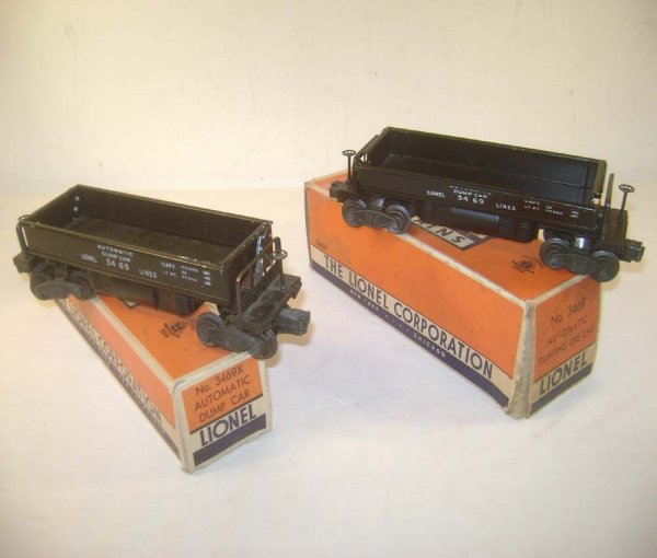 ABT: 2 Lionel #3469 Ore Dump Cars/OBs: Paul V. Ambrose and Drew J. Bauer present: These are two examples of the #3469 Ore Dump Cars that Lionel made in the late 1940s and early 1950s. Our Opinion is that they are generally in Very Good Con