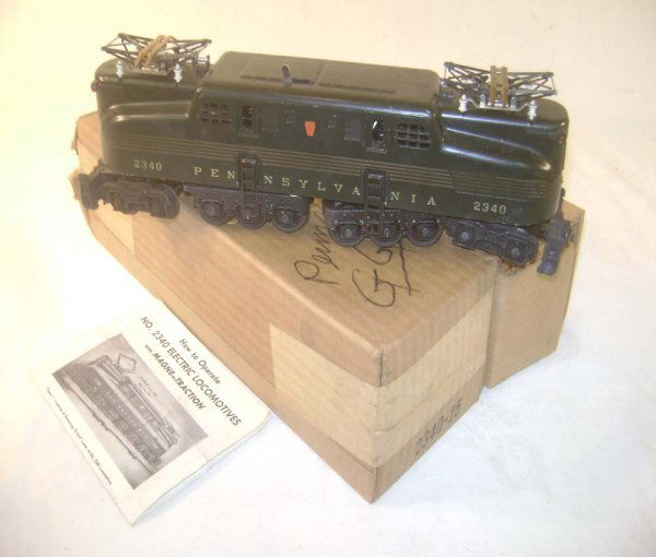ABT: Nice Lionel #2340-25 Green Pennsylvania Five S: Paul V. Ambrose and Drew J. Bauer present: This is the #2340-25 Green Pennsylvania Five-Stripe GG-1 Electric with Dual Motors, Magnetraction and Horn that Lionel made circa 1955. Included in only one