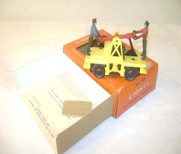 ABT: Exceptional Lionel #65 Motorized Hand Car/OB+: Paul V. Ambrose and Drew J. Bauer present: This is the Lt. Yellow #65 Motorized Hand Car that Lionel made in the 1960s. Our Opinion is that it is generally in Like New Condition; amazingly, no melt-ma