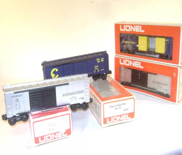 ABT: 4 Assorted Lionel Double Door Box Cars/OBs: Paul V. Ambrose and Drew J. Bauer present: These are four Assorted Double Door Box Cars that Lionel made few years ago. Included are two #9701 B&O Auto Cars, the #9747 Chessie Double Door Box Car and 