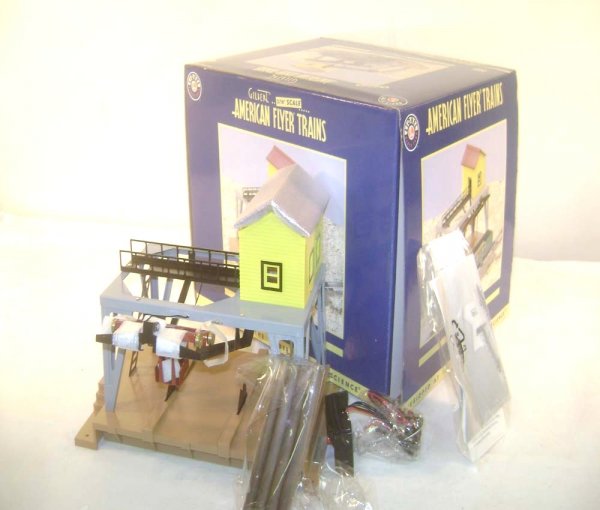 ABT: Lionel/AF S: #49810 Log Loader/OB: Paul V. Ambrose and Drew J. Bauer present: This is the #49810 Log Loader Accessory that Lionel made in its American Flyer S Gauge line a few years ago. Our Opinion is that it is generally in Mint Cond