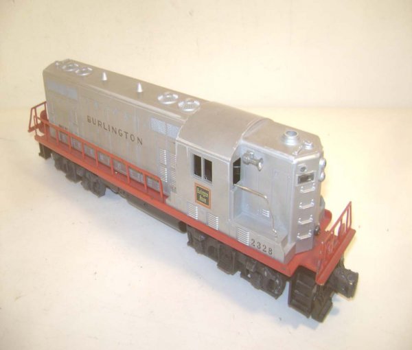 ABT: Lionel #2328 Burlington Silver GP-7 Diesel: Paul V. Ambrose and Drew J. Bauer present: This is the #2328 Burlington GP-7 Diesel with Headlight, Magnetraction and Horn that Lionel made in the middle 1950s. Our Opinion is that it is generally in