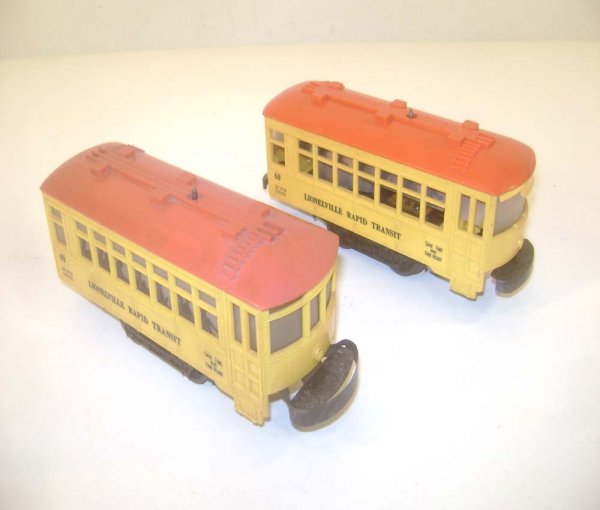 ABT: Two Lionel #60 Black-Letter Trolleys: Paul V. Ambrose and Drew J. Bauer present: These are two #60 Black-letter Trolleys that Lionel made in the 1950s. Our Opinion is that they are generally in Very Good Condition. One chassis with spring