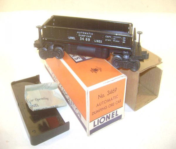 ABT: Lionel #3469 Black Dump Car/Separate-Sale OB+: Paul V. Ambrose and Drew J. Bauer present: This is the Black #3469 Automatic Dump Car that Lionel made circa 1950. Our Opinion is that it is generally in Excellent Minus Condition; average signs of us