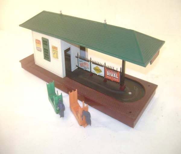ABT: Lionel #356 Operating Freight Station & Carts: Paul V. Ambrose and Drew J. Bauer present: This is the #356 Operating Freight Station with two Original Baggage Carts that Lionel made in the 1950s. Our Opinion is that it is generally in Excellent Mi