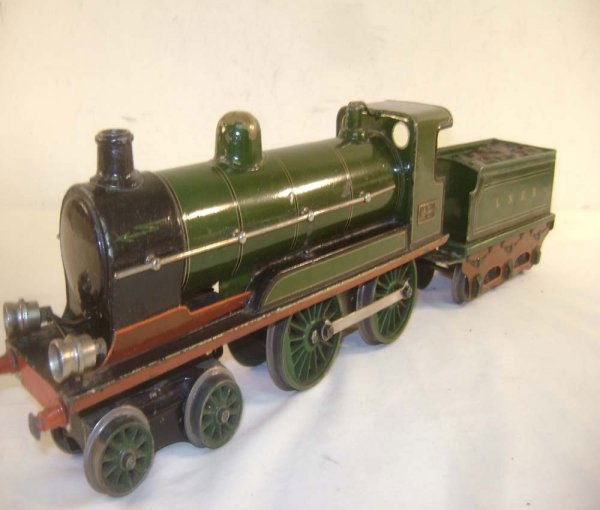 ABT: Marklin 1 Gauge Electric #E3131 4-4-0 Steam Lo: Paul V. Ambrose and Drew J. Bauer present: These are the #E3131 4-4-0 Electric Steam Locomotive and Tender that Marklin made in 1 gauge circa 1930. Our Opinion is that they are generally in Very Good