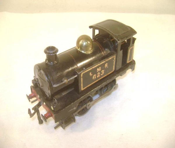 ABT: Black Hornby #623 LMS Clockwork Tank Engine: Paul V. Ambrose and Drew J. Bauer present: This is the Black Clockwork #623 Tank Engine that Hornby made in O-gauge circa the late 1920s. Our Opinion is that it is generally in Very Good Condition. No