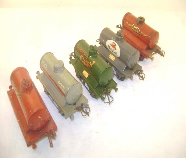 ABT: 5 Assorted Hornby Tank Wagons: Paul V. Ambrose and Drew J. Bauer present: These are five assorted Tank Wagons that Hornby made in O-gauge circa the 1930s. Our Opinion is that they are generally in Very Good Condition; one Shell mod
