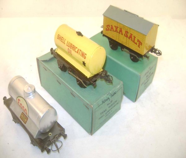 ABT: Hornby Esso & Shell Tank Vans and Saxa Salt W: Paul V. Ambrose and Drew J. Bauer present: These are Esso and Shell Tank Wagons and a Saxa Salt Wagon that Hornby made in O-gauge circa the 1930s. Our Opinion is that they are generally in Excellent C