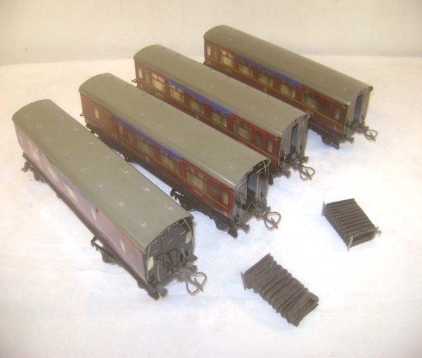 ABT: 4 Hornby Maroon LMS Royal Scot Corridor Coach: Paul V. Ambrose and Drew J. Bauer present: These are four Maroon LMS Royal Scot 1st/3rd Corridor Coaches that Hornby made in O-gauge circa the late 1930s. Include are two each of models #3888 and #684