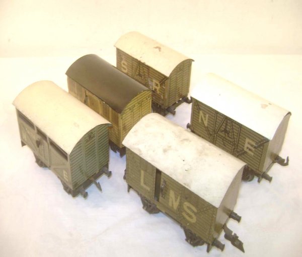 ABT: 5 Assorted O Gauge Bing Vans: Paul V. Ambrose and Drew J. Bauer present: These are five assorted 4 1/2-inch Vans that Bing made in O-gauge circa the 1930s. Our Opinion is that they are generally in Very Good Condition. No Boxes. A