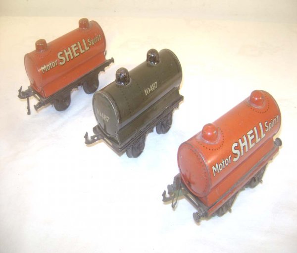 ABT: 3 Nice Bing Tank Wagons: Paul V. Ambrose and Drew J. Bauer present: These are the Olive #10487 and two Red Shell Tank Wagons that Bing made in O-gauge circa the 1920s. Note the lettering is a different color on each of the Sh