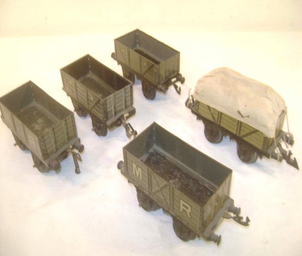ABT: 5 Bing 4-inch Open Goods Trucks: Paul V. Ambrose and Drew J. Bauer present: These are five assorted 4-inch Open Goods Trucks that Bing made in O-gauge circa the 1920s. Our Opinion is that they are generally in Very Good Condition. No
