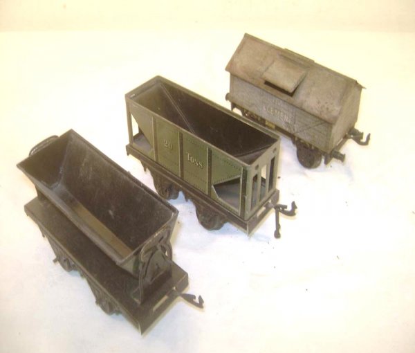 ABT: 3 Assorted Bing Olive-Colored Rolling Stock I: Paul V. Ambrose and Drew J. Bauer present: These are three olive-colored Rolling Stock items that Bing made in O-gauge circa the 1920s. Included are an open Hopper Wagon, Side-Tipping Wagon, and a Lim