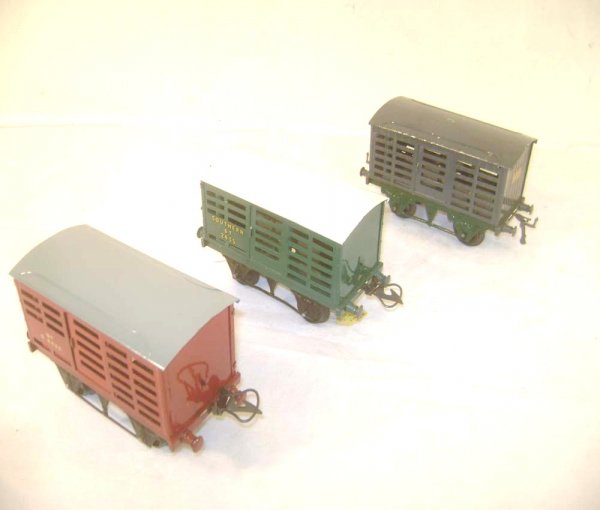 ABT: 3 Assorted Hornby Cattle Wagons: Paul V. Ambrose and Drew J. Bauer present: These are three assorted Cattle Wagons that Hornby made in O-gauge circa the 1930s. Our Opinion is that two are generally in Good Condition, while one exampl