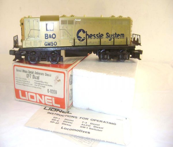 ABT: Scarce Lionel #8359 GM 50 Gold Chessie GP Dies: Paul V. Ambrose and Drew J. Bauer present: This is the #8359 Gold Chessie GP Diesel that Lionel made in the early 1970s. Scarce. Our Opinion is that it is generally in Excellent Plus Condition, minor 