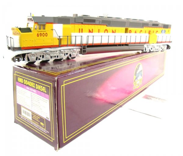 ABT: Great MTH #20-2178-1 Union Pacific #6900 DD40: Paul V. Ambrose and Drew J. Bauer present: This is the #20-2178-1 Union Pacific #6900 DD40AX Diesel with Dual Motors, Directional Constant Headlights, two Protosmoke Units, Engineer Figure, Protocoupl